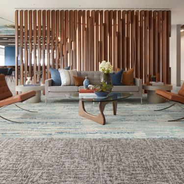 Interface Third Space 306 carpet tile with Undulating Water plank carpet tile in lobby image number 1