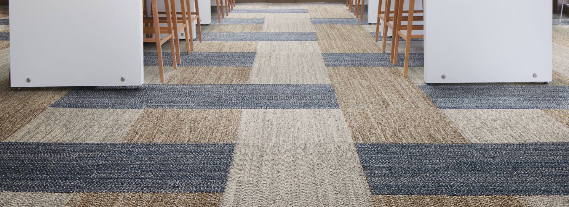 Interface Third Space 307 carpet tile in casual dining seating area