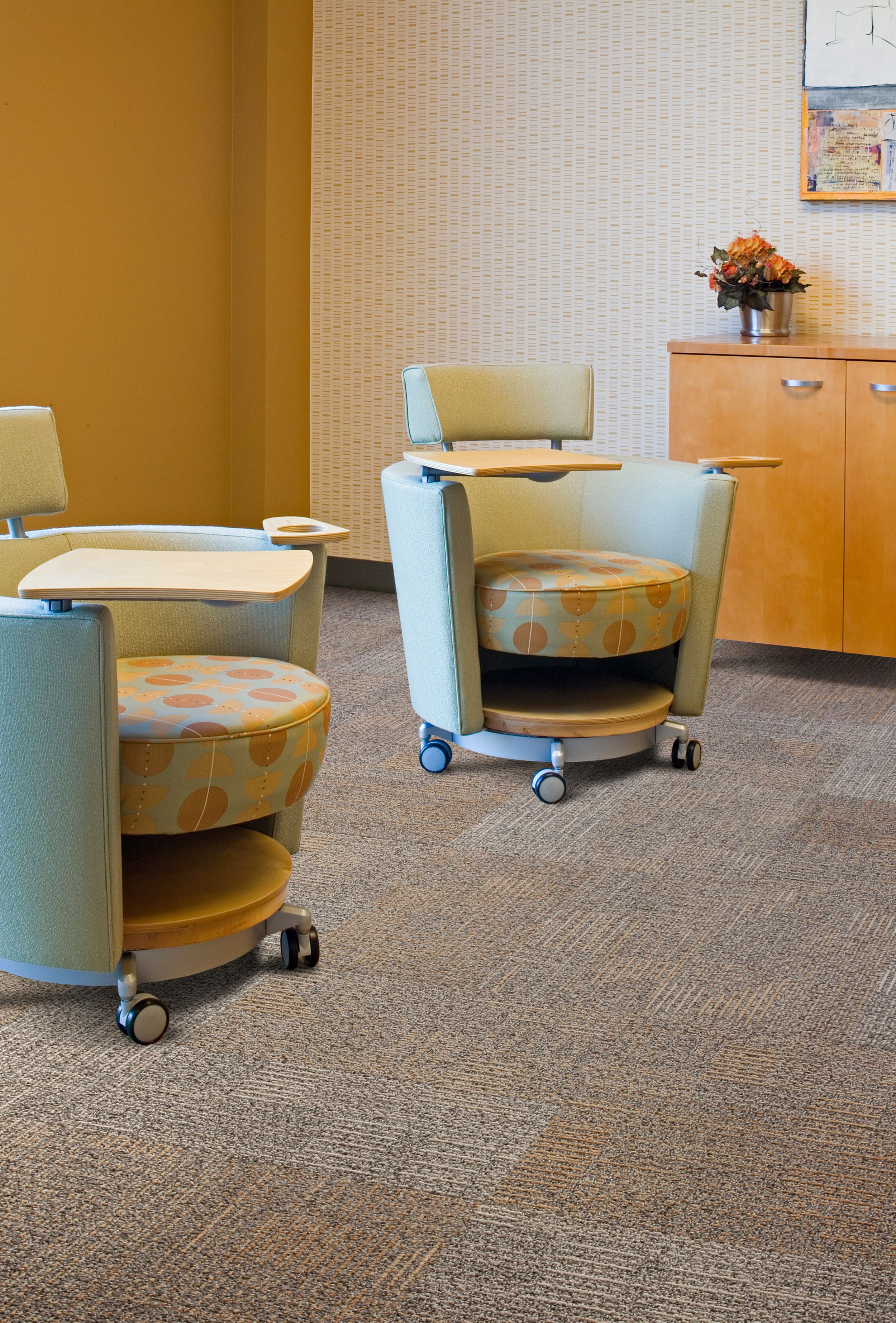 Interface carpet tile in room with wheeled chairs with trays image number 3