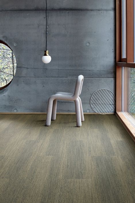 Interface Touch of Timber plank carpet tile with contemporary chair and pendant light