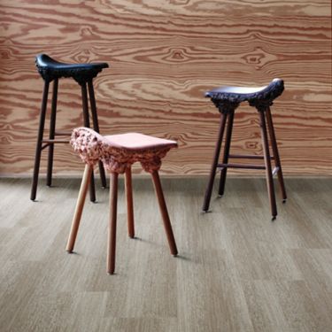 Interface Touch of Timber plank carpet tile in room with plywood wall and three unusual stools image number 1