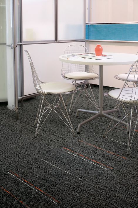 Interface UR303 and UR304 carpet tile in seating area with small table and chairs image number 2
