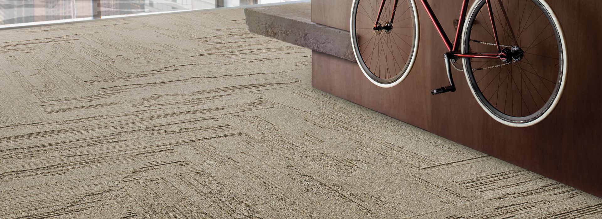 Interface UR501 plank carpet tile in office common area with bike 