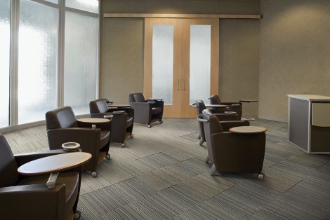 Interface Micro Line and Pin Line carpet tile in presentation room with brown chairs image number 2