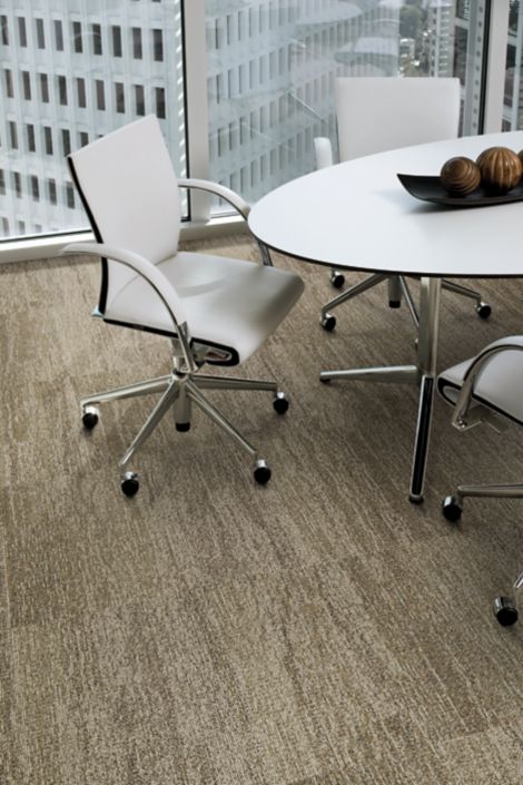 Interface Vermont carpet tile in office with table and three chairs