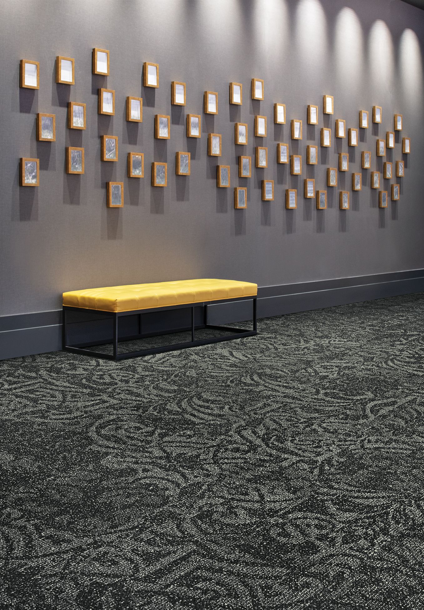 Interface Villa Scroll carpet tile in hallway with bench and frames on the wall imagen número 1