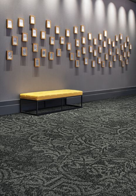 Interface Villa Scroll carpet tile in hallway with bench and frames on the wall imagen número 5