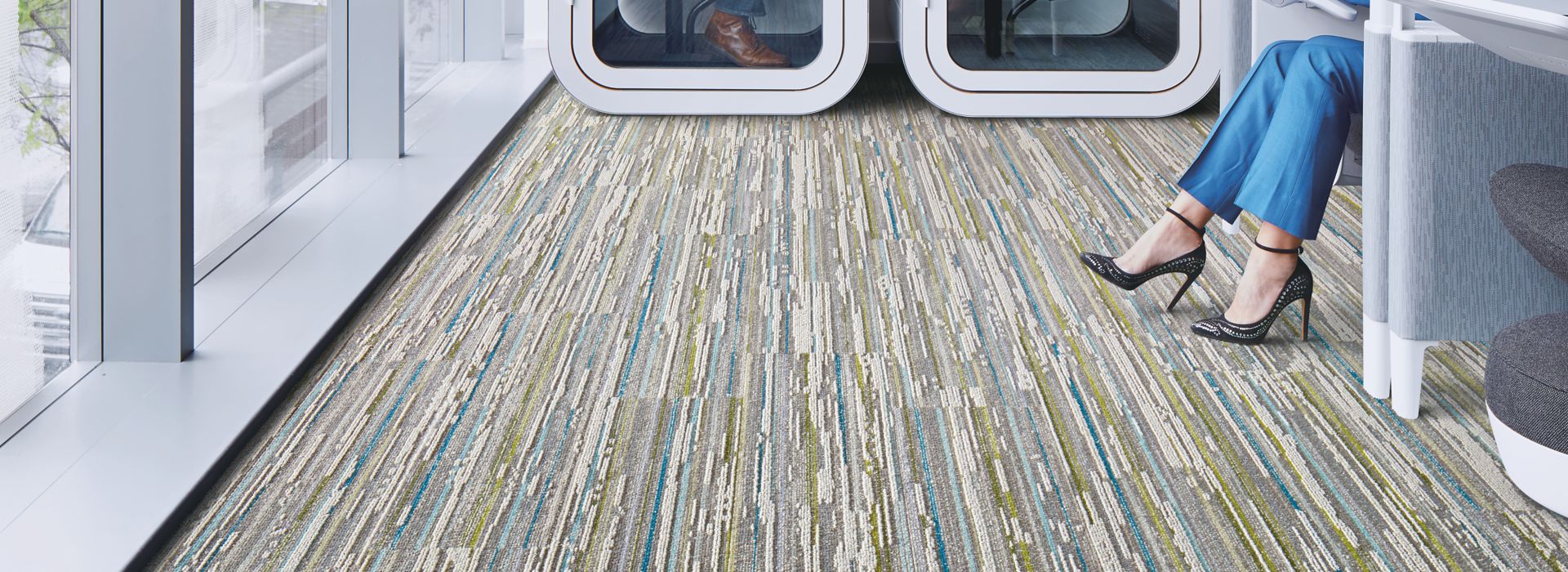 Interface Video Spectrum carpet tile in office common area showing work spaces