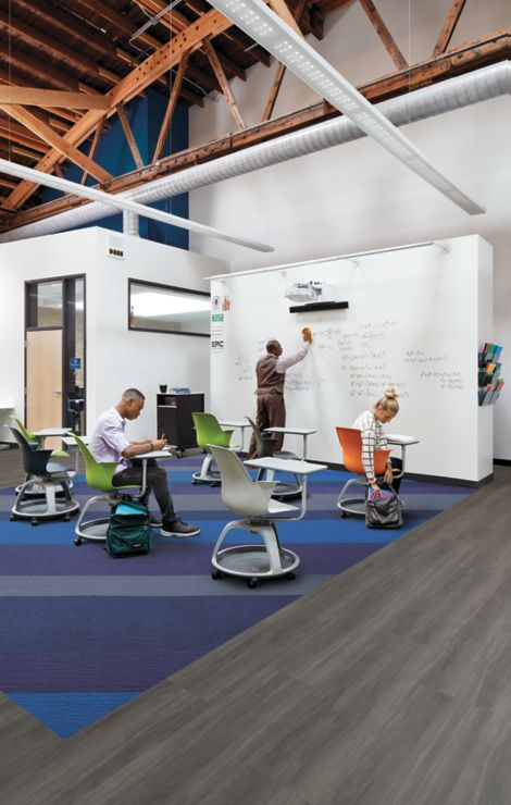 Interface Viva Colores carpet tile and Studio Set LVT in class room setting with white board image number 6