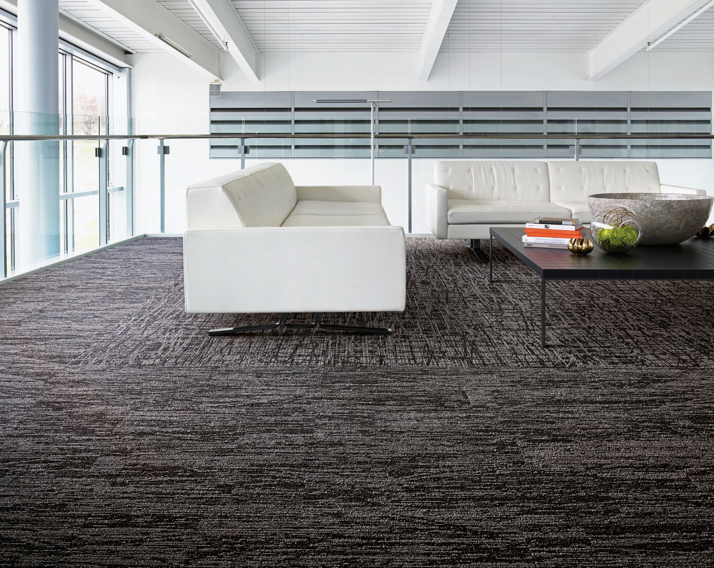 Interface WE151 and WE153 carpet tile in seating area with couch imagen número 1