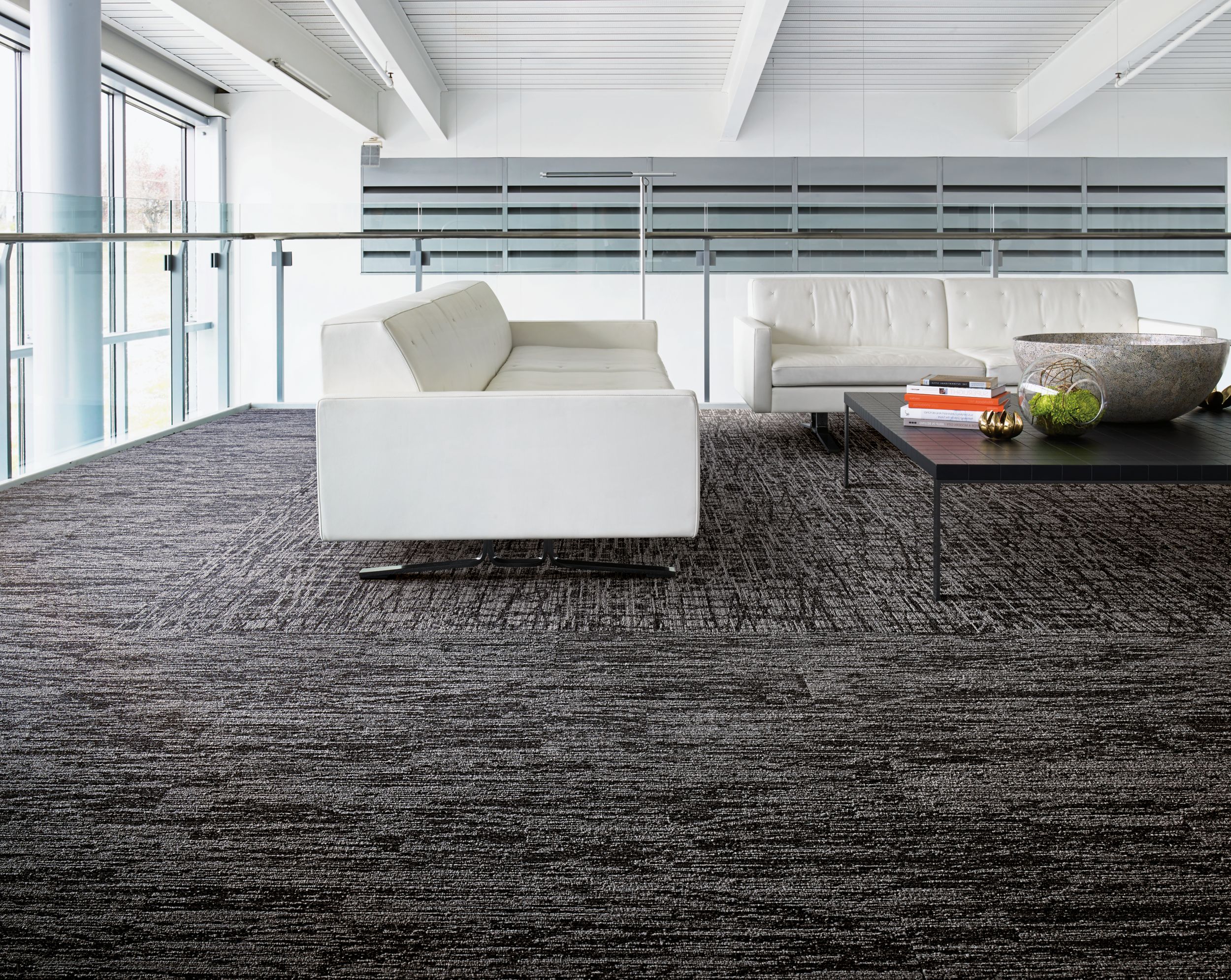 Interface WE151 and WE153 carpet tile in seating area with couch image number 1