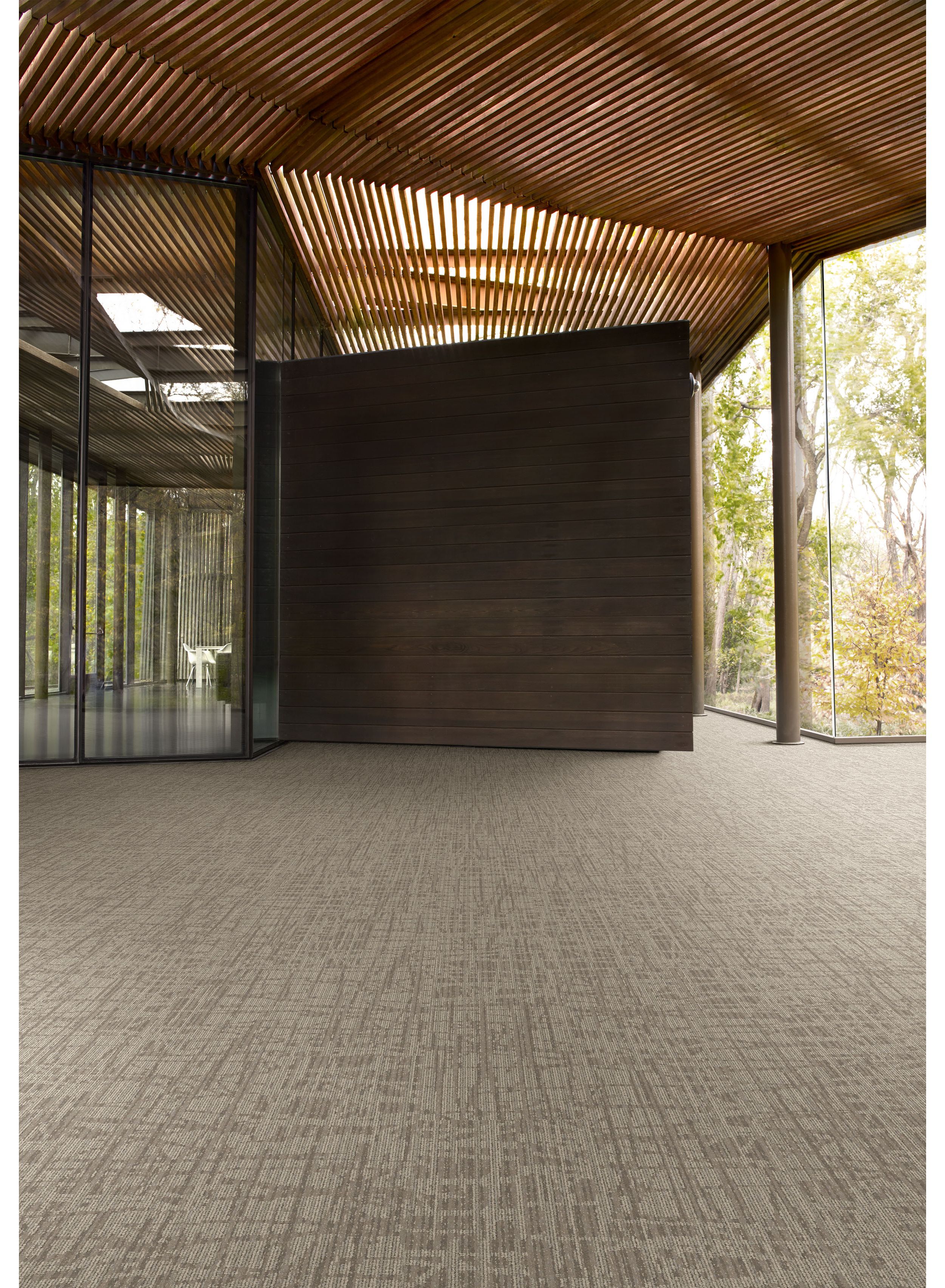 Interface WE153 plank carpet tile in open lobby area image number 2