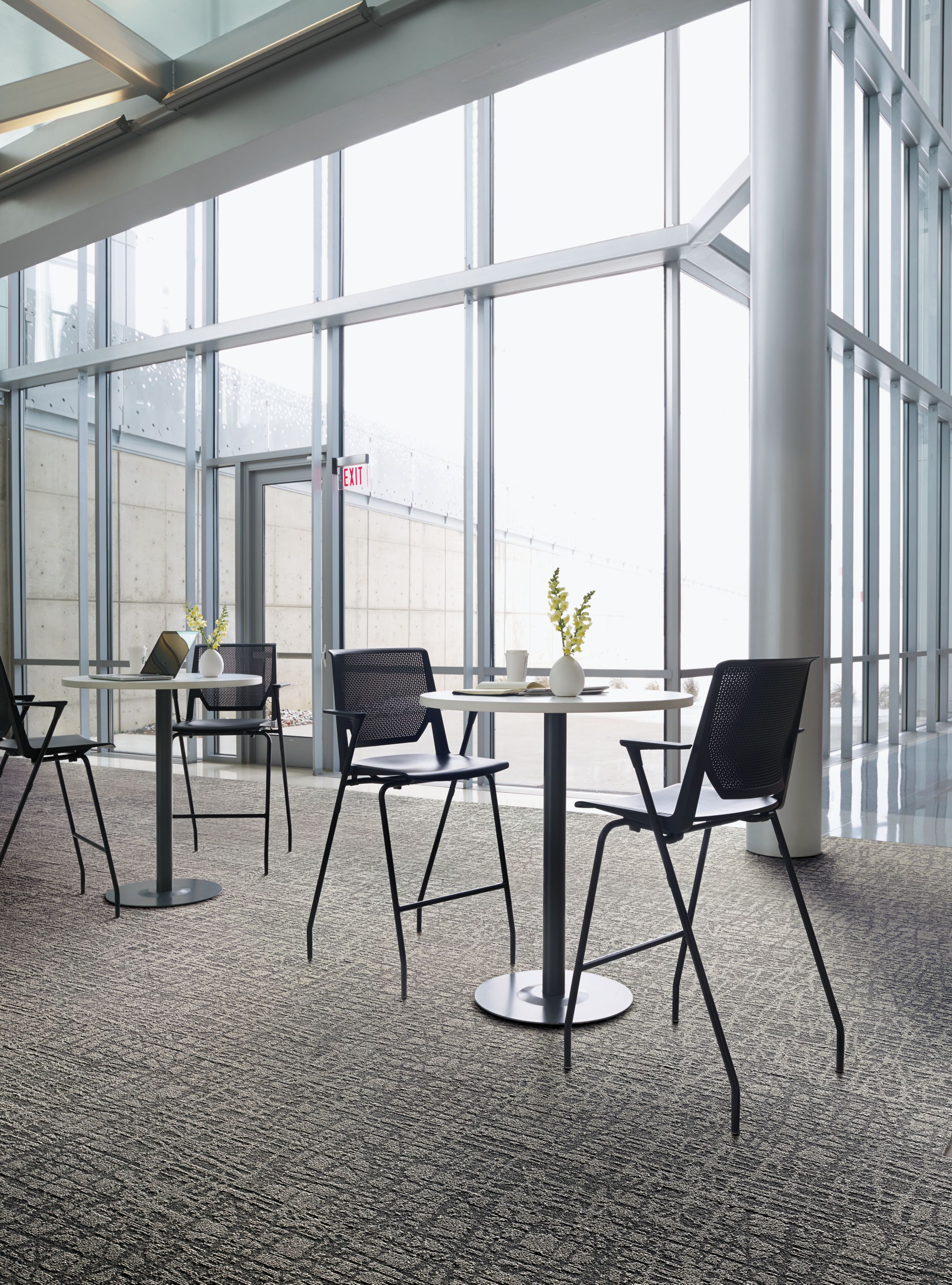 Interface WE153 plank carpet tile in meeting area with high top tables image number 1