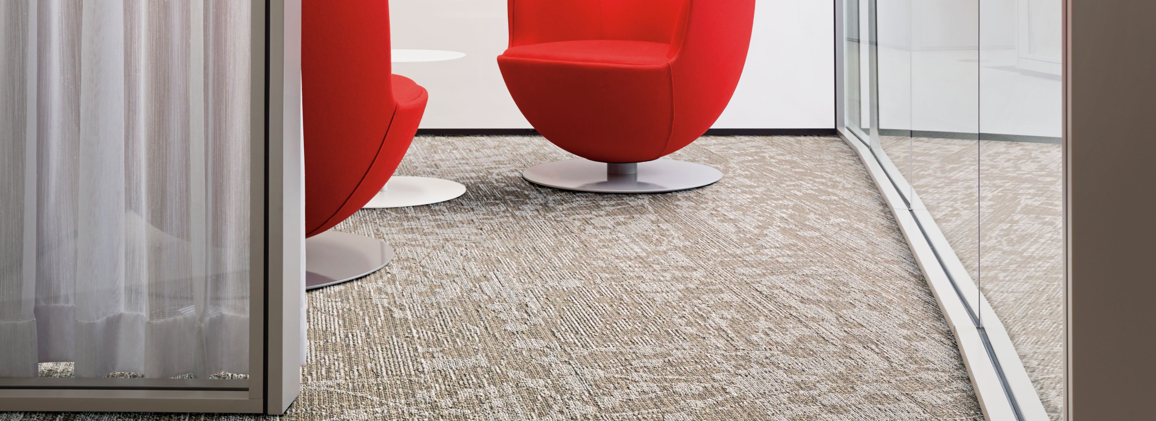 Interface WE154 plank carpet tile in waiting area with large red statement chairs image number 2