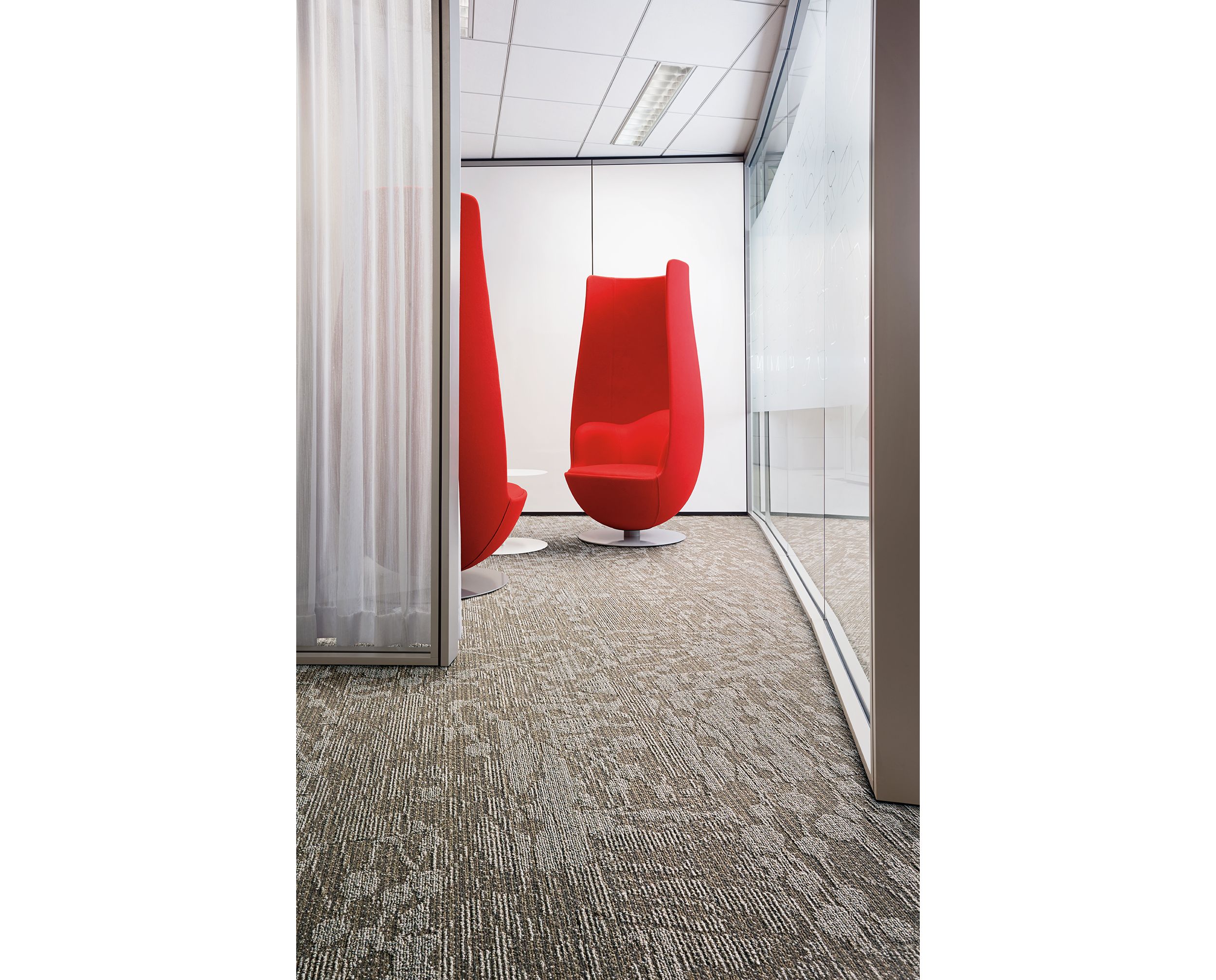 Interface WE154 plank carpet tile in waiting area with large red statement chairs image number 1