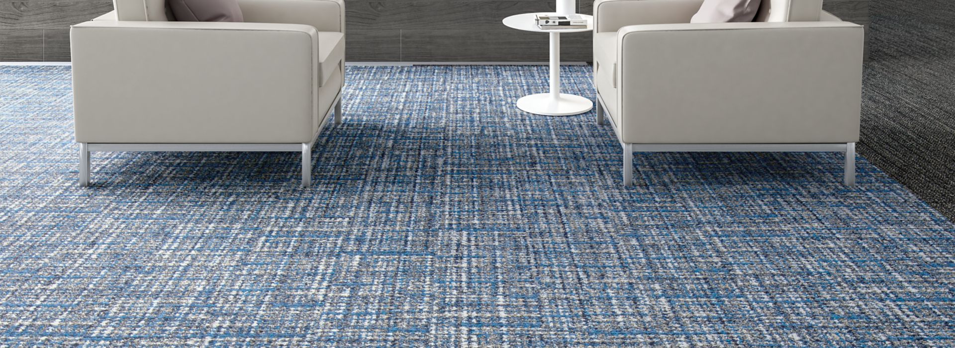 Interface WW895 plank carpet tile in lobby area with couches and side table 