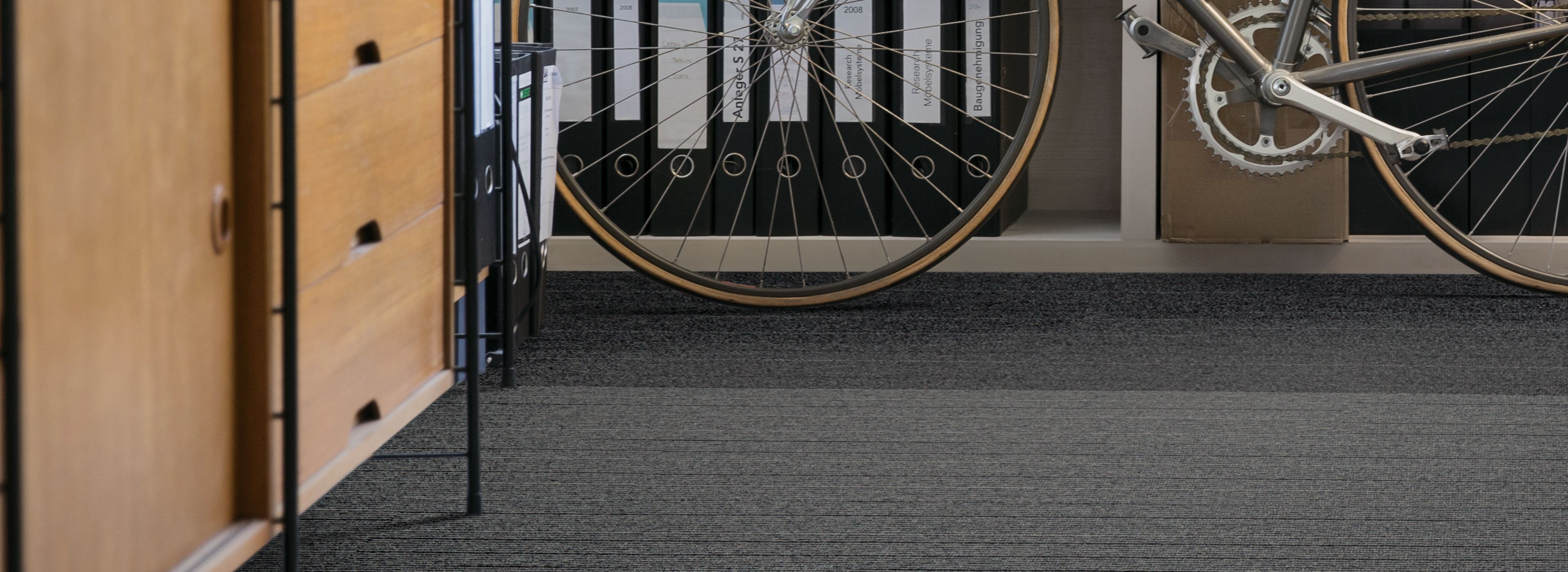 Interface YesterWeave plank carpet tile in office area with bike image number 1