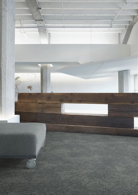 Interface Angle Up plank carpet tile in reception area with wooden desk