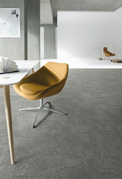 Interface Flat Rock carpet tile with gold chair