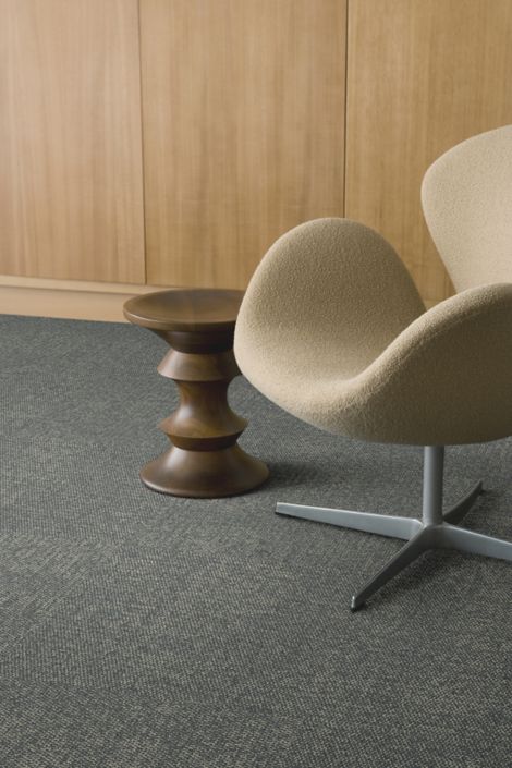Detail of Interface Lighthearted carpet tile with chair and Eames stool imagen número 5