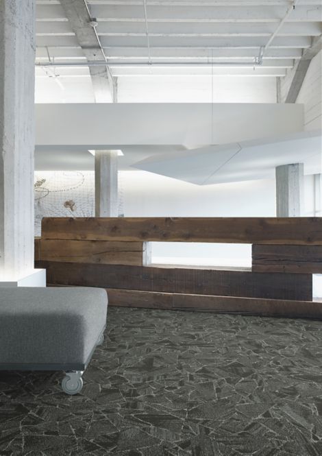 Interface Mile Rock carpet tile in room with wooden art structure and white walls imagen número 9