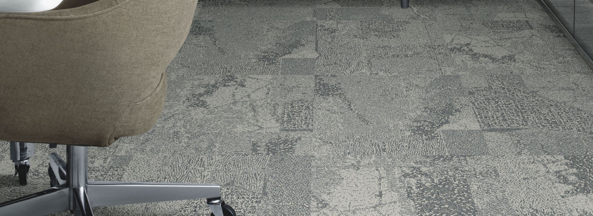 Interface Mountain Rock carpet tile in private office with credenza, table and chairs