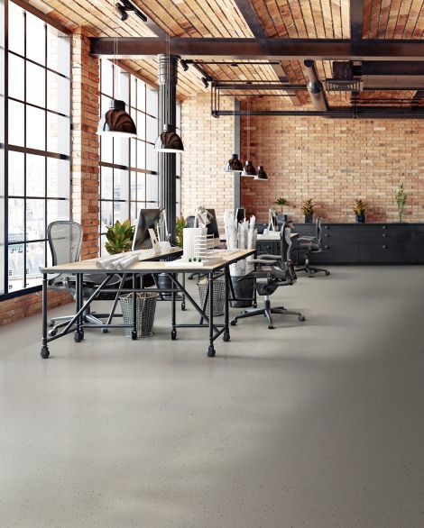 norament 926 kivo rubber flooring in open office workspace with exposed brick imagen n&uacute;mero 9