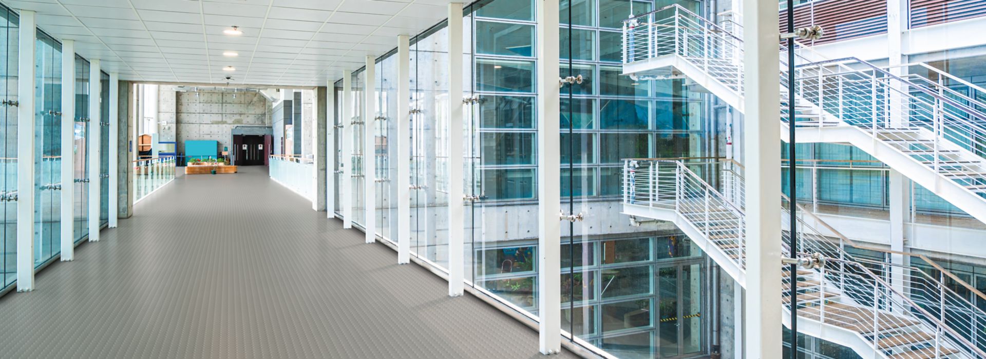 norament 825/926 rubber flooring in modern building corridor