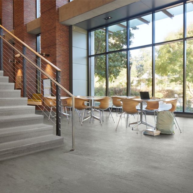 norament 926 arago Rubber Flooring in open space with tables and chairs