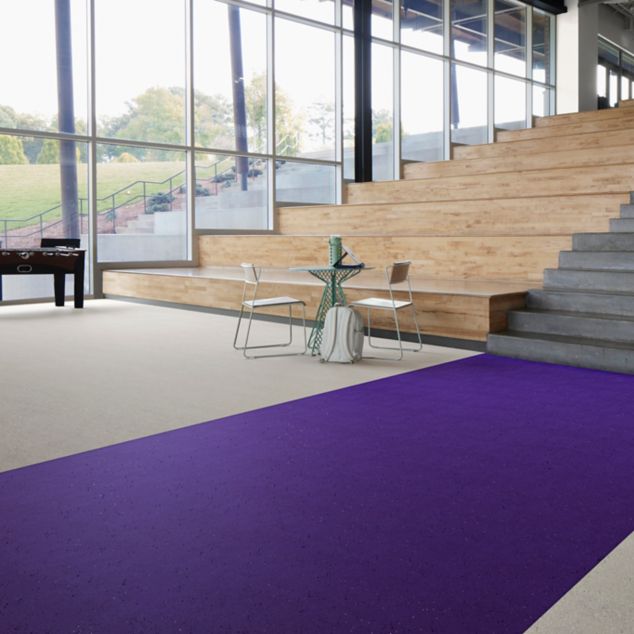 norament kivo rubber flooring in lobby area with wide stairway