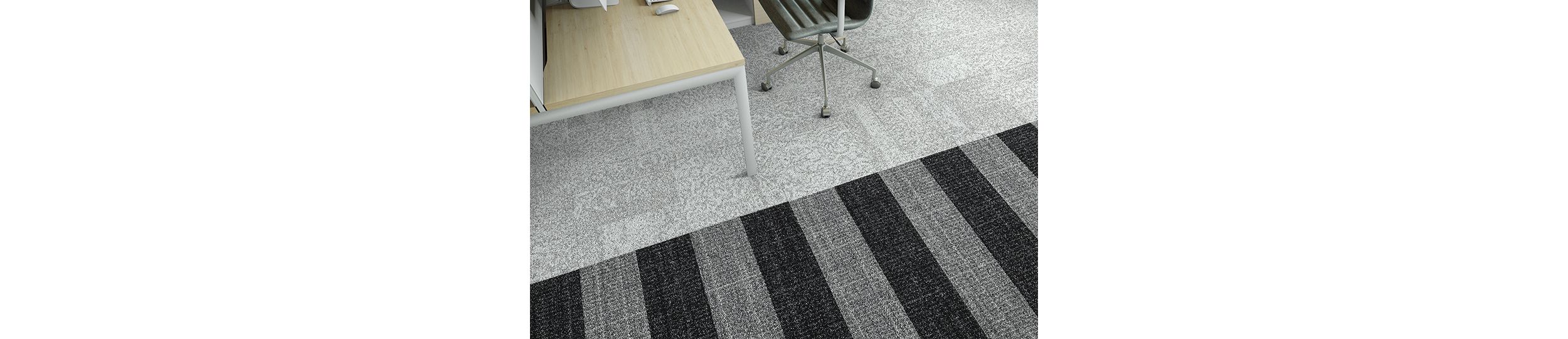 Interface Open Air 405 carpet tile in overhead view with wooden desk and leather rolling chair imagen número 6