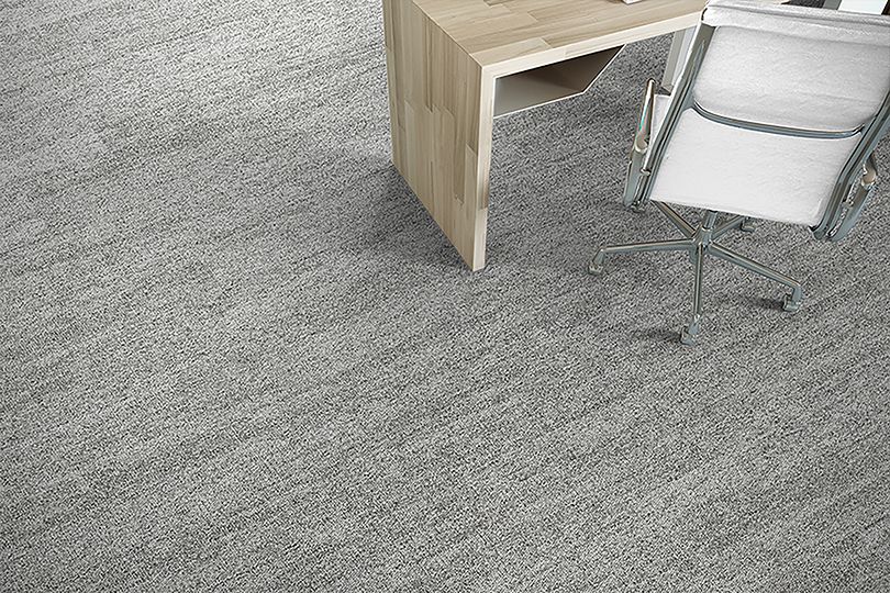 Interface Open Air 402 plank carpet tile in floor view with wood work desk and rolling office chair image number 7