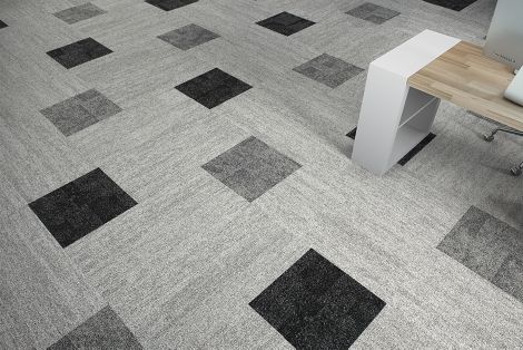 Interface Open Air 402 plank carpet tile in floor view with small workstation off to the right