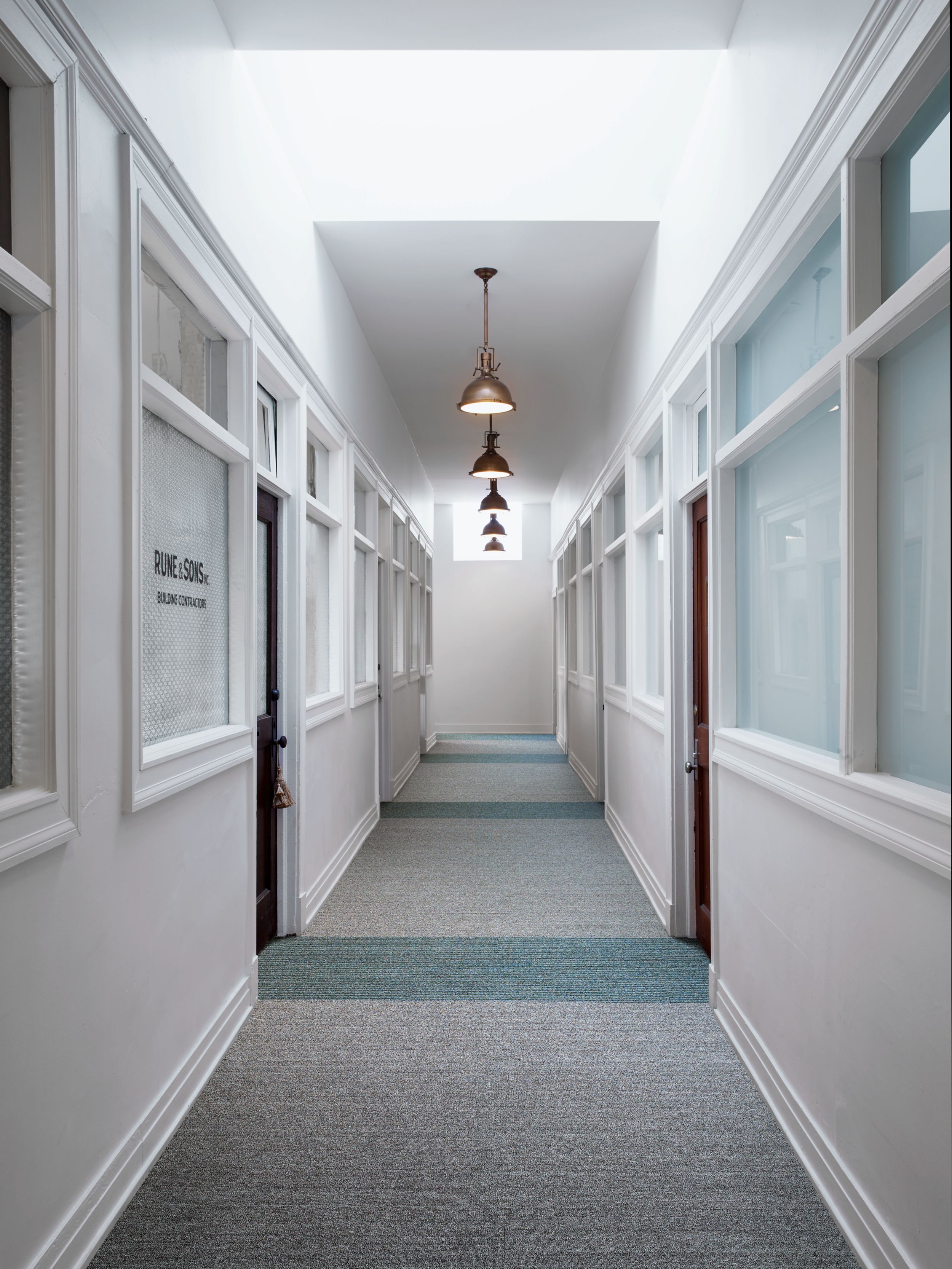 Interface WW860 and WW865 plank carpet tile in a building corridor image number 8