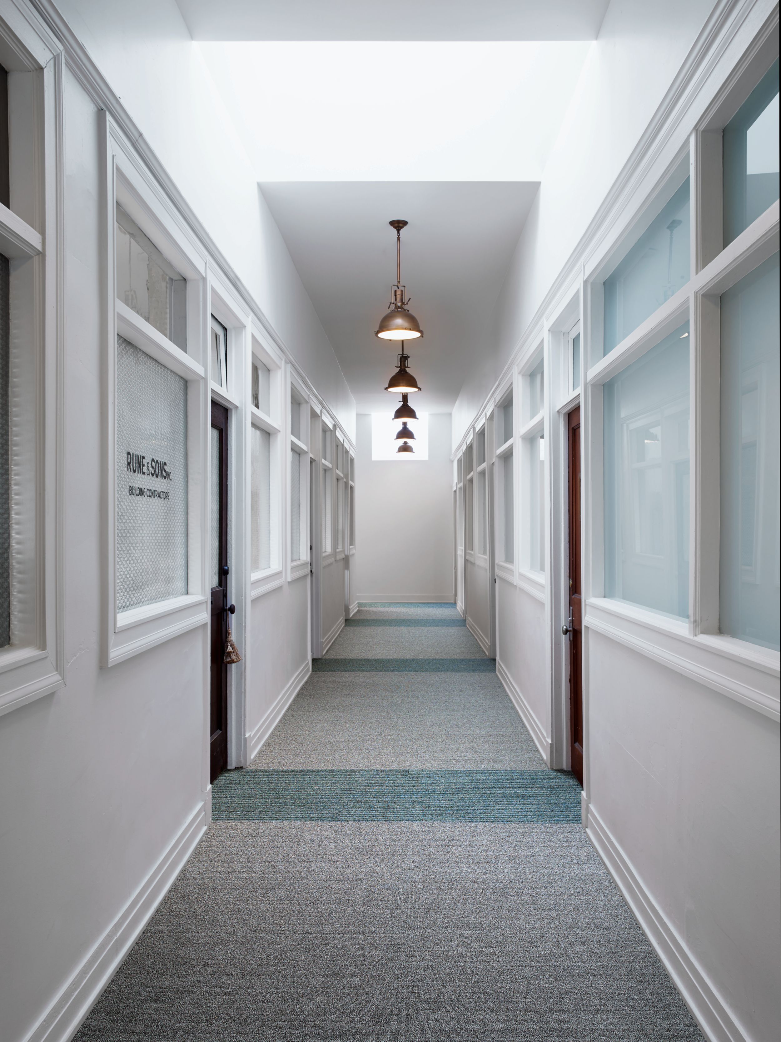 Interface WW860 and WW865 plank carpet tile in a building corridor image number 7