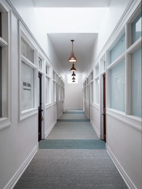 Interface WW860 and WW865 plank carpet tile in a building corridor image number 6