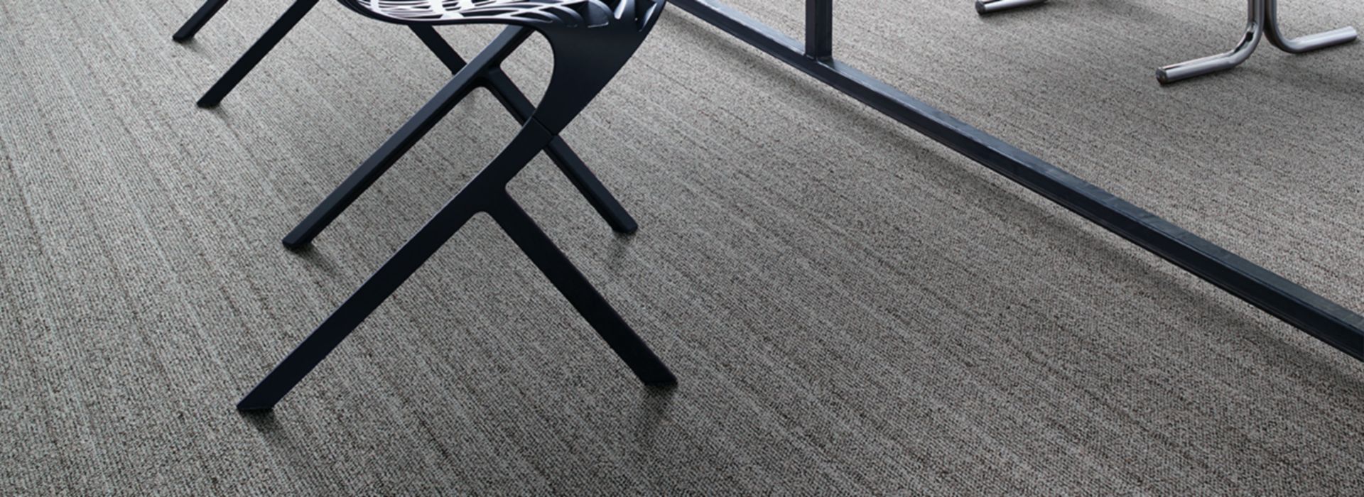 Interface WW860 plank carpet tile in work area with table and chairs