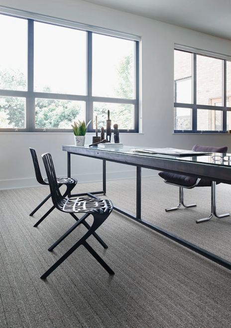Interface WW860 plank carpet tile in work area with table and chairs