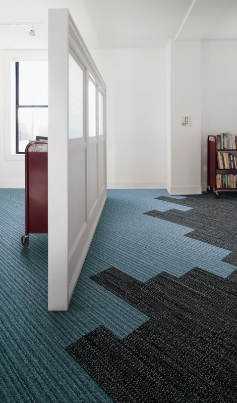 Interface WW865 and WW870 plank carpet tile in office with dividing wall