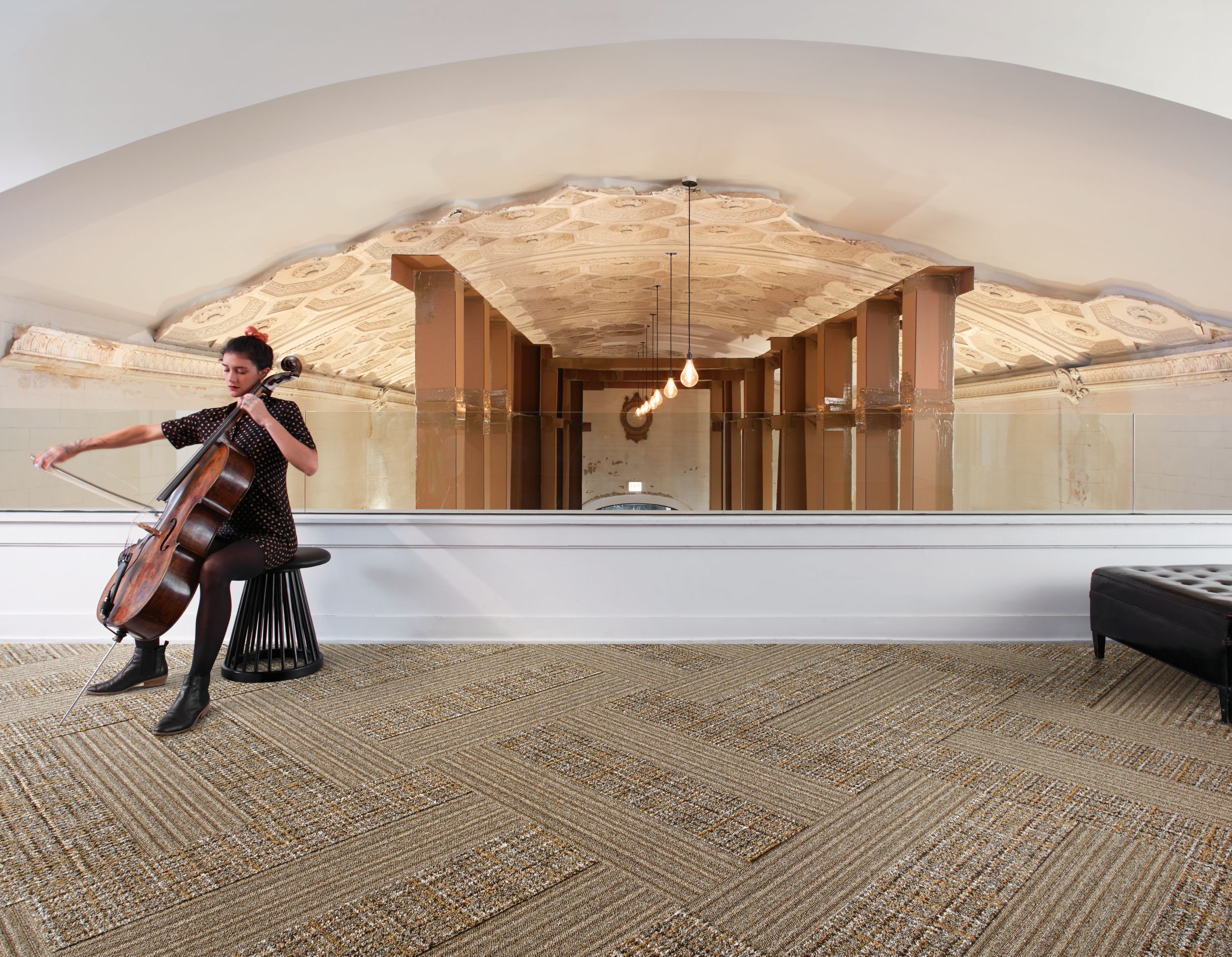 Interface WW865 and WW895 plank carpet tile in lofty space with musician image number 4