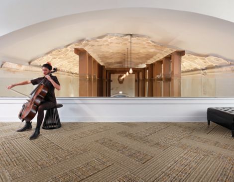 image Interface WW865 and WW895 plank carpet tile in lofty space with musician numéro 5