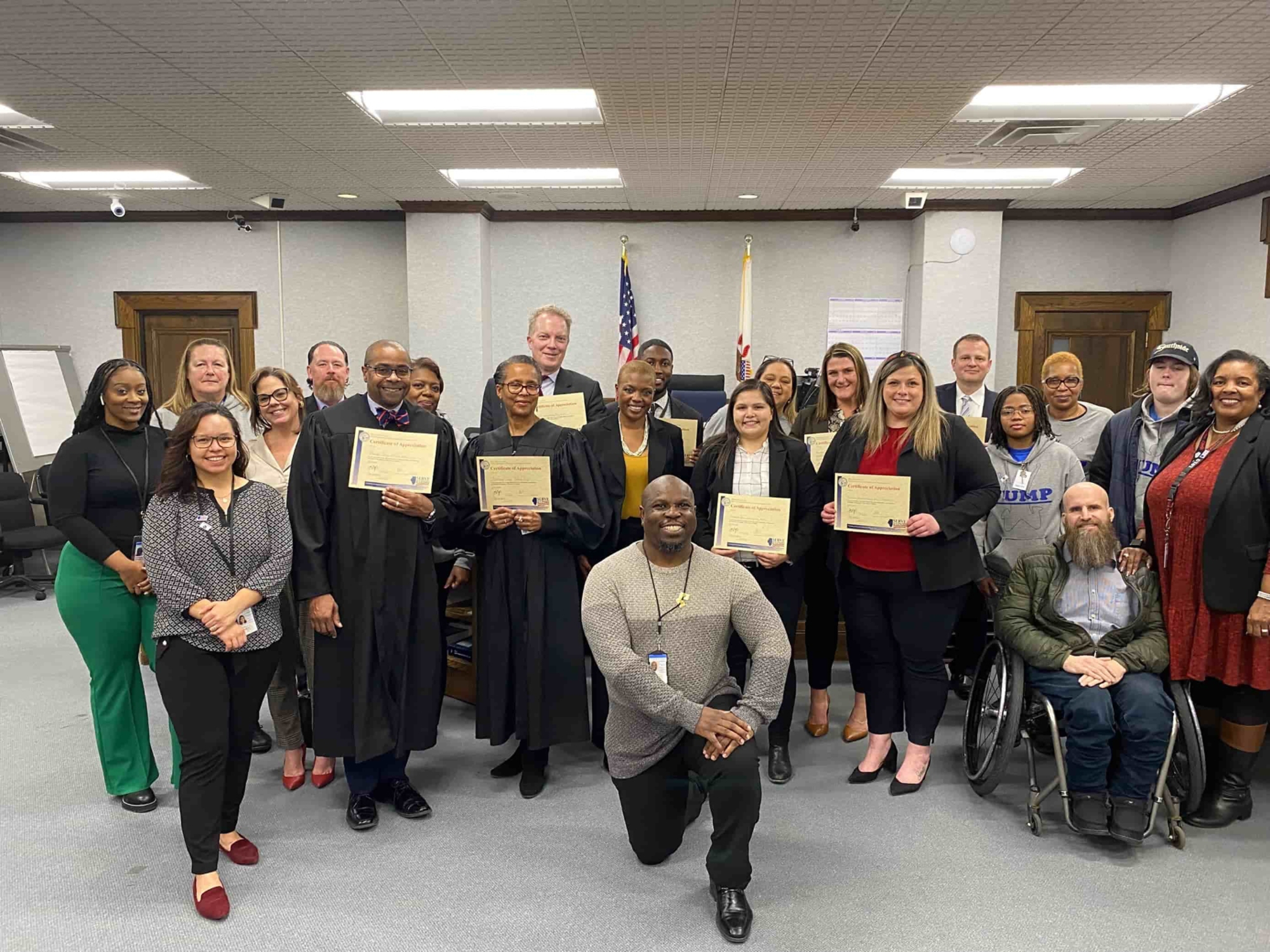 Group picture with Justice Learning Lab participants and staff with Governor's Certificates 