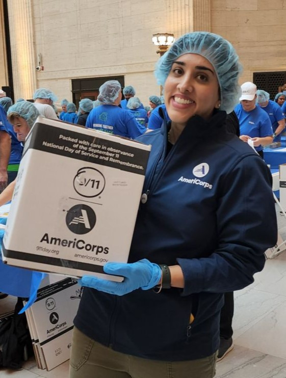 9/11 Day picture - volunteer carrying box