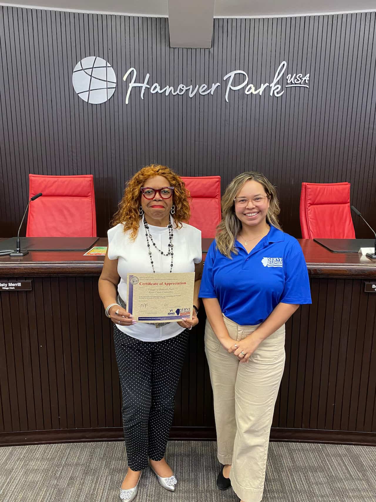 Serve Illinois Volunteer Service Program Coordinator Cecilia Maciel Martinez with Governor's Certificate recipient
