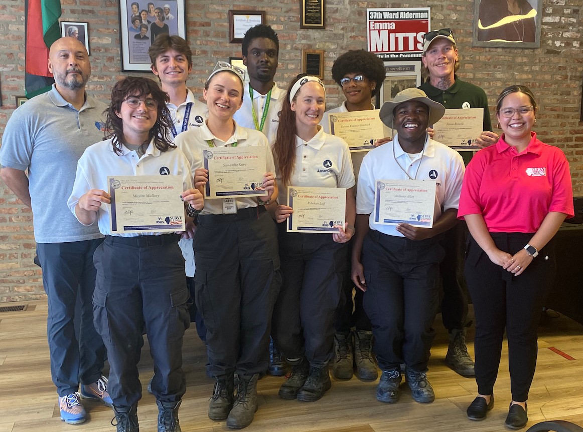 Group picture with NCCC volunteers with Governor's Certificates 