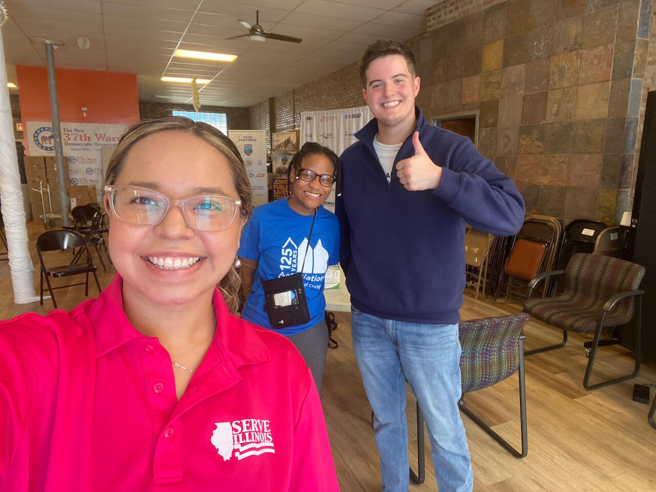 Serve Illinois Volunteer Service Program Coordinator Cecilia Maciel Martinez with volunteers and AmeriCorps members 