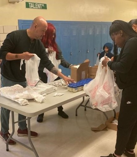 Executive Director Andres Fernandez volunteering at Public Allies MLK Day of Service