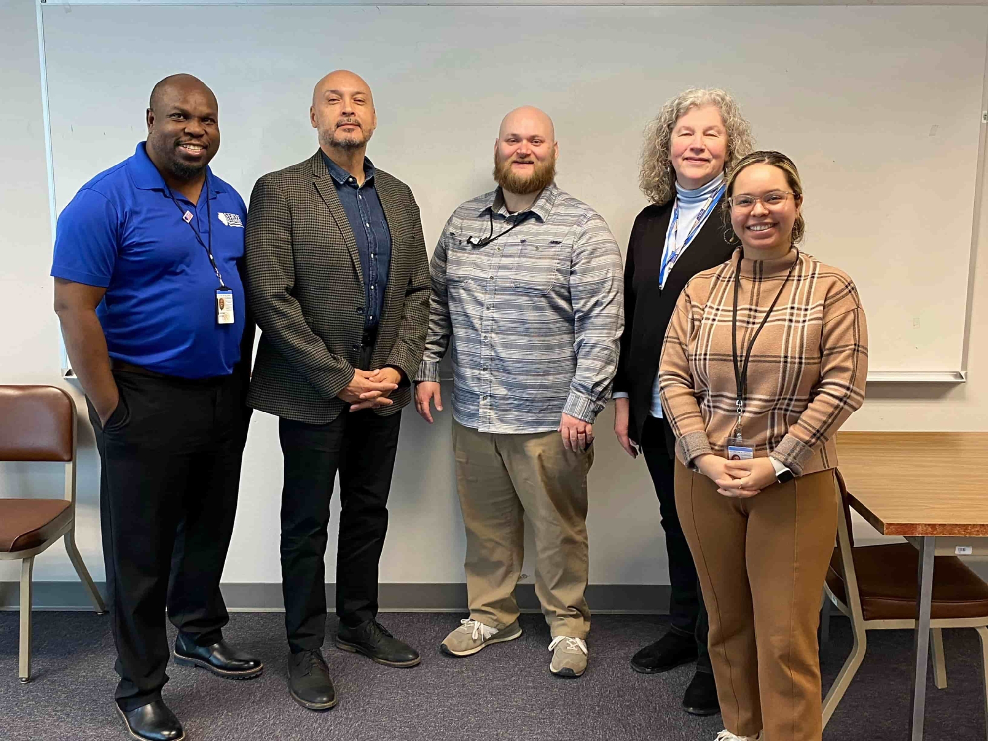 Serve Illinois team Andres Fernandez, Jacob Jenkins, Cecilia Maciel Martinez, along with Anne Robertson and Tim Little from Federal Emergency Management Agency, and Serve Illinois Commissioner John Gremer at IDHS offices in Chicago.