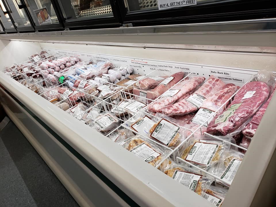 stock photo - meat in open long freezer