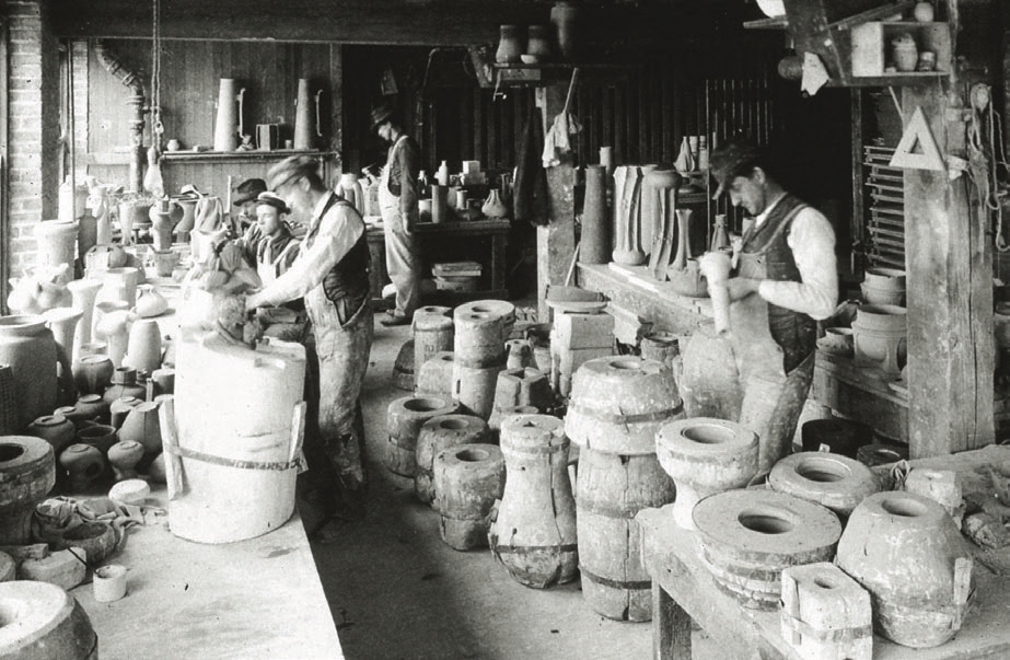 Workmen unmolding Teco art pottery at Gates Potteries, a subsidiary of the American Terra Cotta & Ceramic Company, in Terra Cotta (now Crystal Lake) around 1905